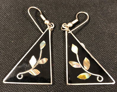 Vintage Mexican Alpaca Earrings: Description: Pretty pair of vintage Mexican Alpaca silver pierced earrings with mother of pearl accents set in a graceful floral pattern. Stamped on reverse side. Created in the early 18th century, Al