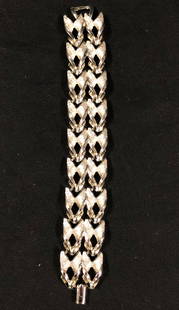 Vintage Ladies Bracelet: Description: Fabulous vintage silver tone metal bracelet designed with shiny and burnished metal interwoven links. Material: metal. Measurement: approximate 8" (INCHES). Shipping: $12; different rate