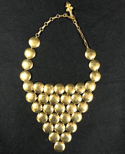 Statement Worthy Bib Necklace: Description: Statement worthy gold tone bib necklace; great vintage! Adjustable closure. Material: metal. Measurement: approximate 16"l with 4" drop. Shipping: $12; different rate to Alaska,