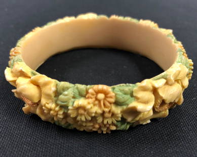 Gorgeous Vintage Bakelite Yellow Bangle Bracelet: Description: Wonderful retro jewelry find! Vintage Bakelite Yellow/ green floral engraved Bangle Bracelet. Item is approximately 90 Yrs. old. Measurement approximate 8" (INCHES). Shipping: $15.00