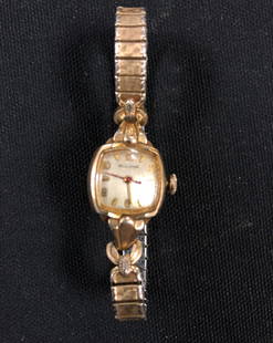 Vintage Bulova Ladies Wrist Watch: Vintage Bulova ladies watch wind up and runs. Watch is gold tone with a gold plate metal wrist band. Shipping: $12.00 within the United States only.