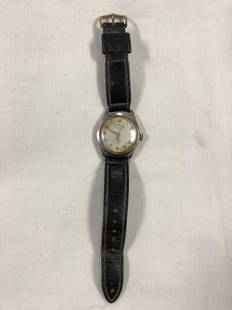 Vintage Andre Bouchard 17 Jewel Mens Watch/ Works: Description: Vintage Andre Bouchard Men's Watch Movement 17 Swiss 1802/ Shock resistance.Black leather band. Material: metallic. Shipping: $12.00 within the United States only.