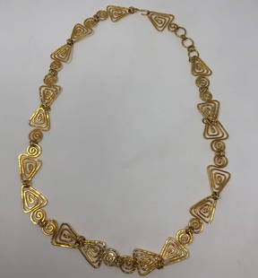 Vintage Gold Tone Link Belt: Description: Marvelously retro gold tone link belt, set with swirled links of varying sizes. Material: metal. Measurement: approximate 36.50" (INCHES). Shipping: $15; different rate to Alaska,