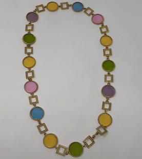 Vintage Glass Necklace: Description: Striking vintage glass and gold tone metal necklace, set with round, colored glass in blue, yellow, purple and green, separated by square gold tone metal links. Material: glass;