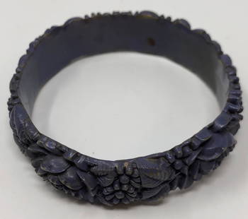 Bakelite Purple Floral Carved Molded Bangle: Description: Vintage bakelite purple molded bangle. Lovely wisteria blue/purple color carved with a profusion of tiny flowers. Material: plastic. Measurement: approximate size 7. Shipping: $12; differ