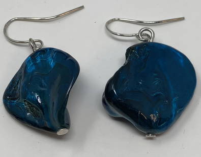 Great Vintage Molded Pierced Earrings: Description: Great vintage molded plastic pierced earrings, set on silver tone wire. The earrings are a magnetic deep blue color. Material: plastic. Measurement: approximate 1.50" (INCHES). Shipping: