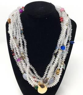 Vintage Aurora Borealis Faceted Beaded Necklace: Description: Marvelous 4-strand vintage Aurora Borealis faceted beaded acrylic necklace with gold tone clasp to shorten into an 8-strand torsade. Set with accents beads in a myriad of colors and