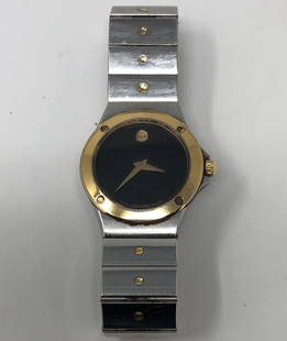 Sleek Movado Museum Ladies Watch: Description: Sleek Movado Museum 81-A1-816 Swiss Movement Quartz ladies watch with gold tone bezel. Material: metal; glass. Measurement: approximate size 7. Shipping: $15; different rate to Alaska,