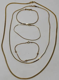 Faux but No One Has to Know!: Description: Faux but only you will know! Here is a great set of 2 pieces with gold tone settings and diamond-style (faux) stones. One lovely ring with a stone in the middle and one smooth link