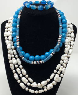 Gorgeous White and Blue Vintage Jewelry: Description: Just gorgeous collection of 3 vintage necklaces and one bracelet; all in soothing shades of white and blue. Set includes: one fabulous, opera length vintage white stone necklace, one