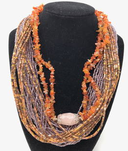 Sunset Necklace Collection: Description: Elegant set of vintage acrylic beaded necklaces in sunset shades of bronze, lilac and deep orange. Nice older vintage items, wear alone or together for added effect. All have