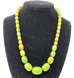 Vintage Child  beaded necklace: Description: Another unusual vintage find! Lovely natural green stone beaded necklace, crafted exclusively for a child. Stones vary in size and are all a tranquil shade of green, possibly Aventurine,