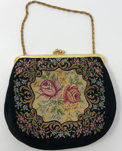 Pretty Tapestry Evening Bag: Description: Pretty tapestry evening bag with gold tone accents and gold tone link chain. Fabric bag depicts 2 blooming roses against a black background. Clasp closure, small interior pocket.