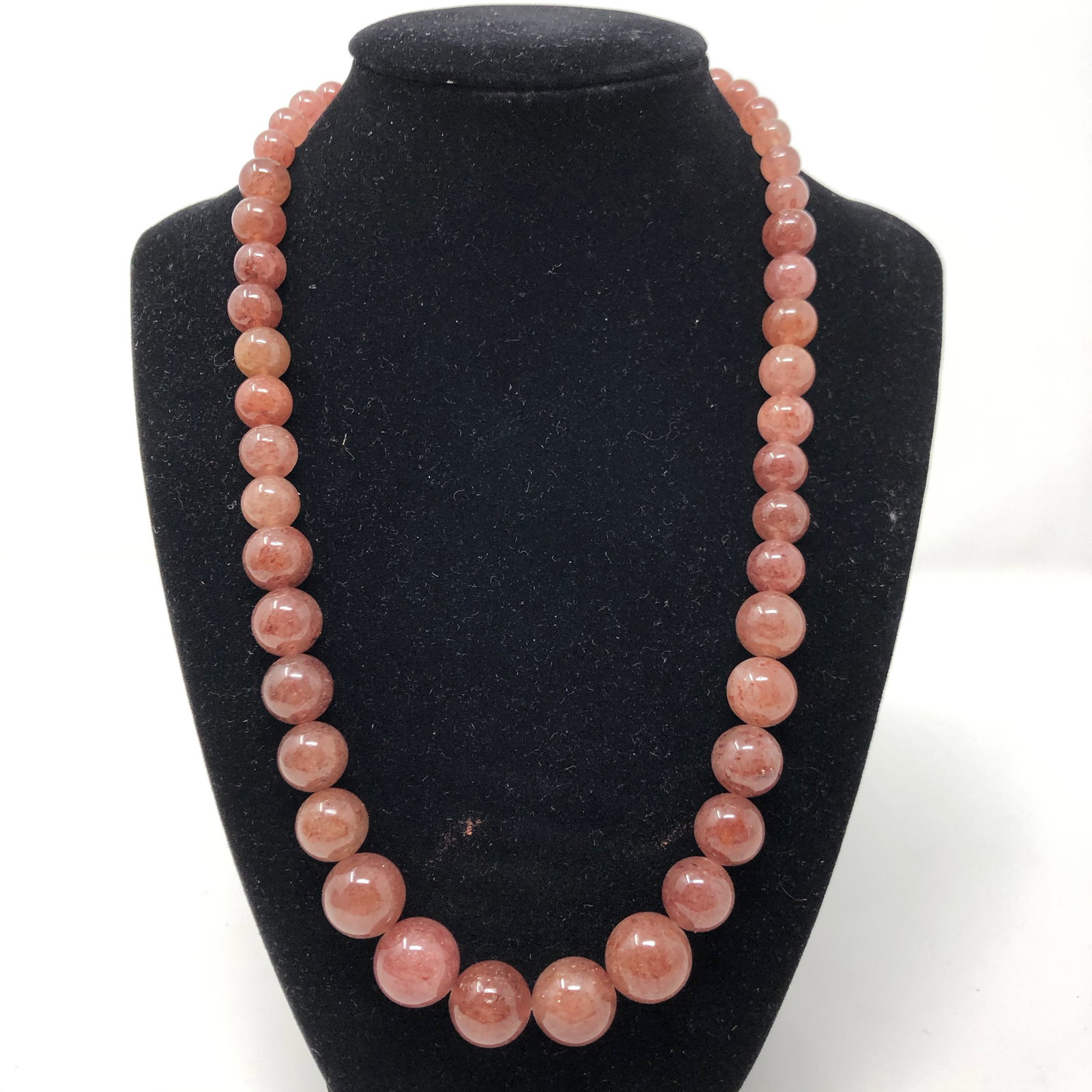 Purple Spinel and Sterling Necklace: Description: Distinctive beaded necklace of highly polished purple spinel capped with sterling. This purple stone is pale in intensity, and appears lavender or lilac in tone.A favorite shade of many, 