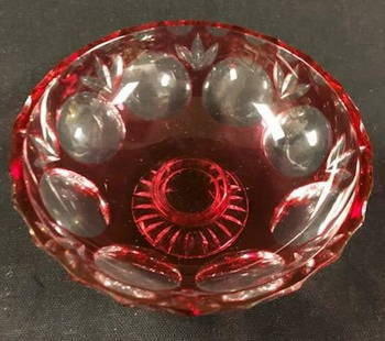 Footed Cut to Clear Red Crystal Coupe: Description: Very appealing footed cut to clear red crystal glass coupe bowl. Striking design. Material: glass. Measurement: approximate 3"h x 5"w (INCHES). Shipping cost:15 ;different rate applies