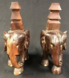Vintage Carved Wood Elephant Pair Incense Burners: Description; Vintage carved wood elephant pair incense burners. Incense burners sit atop elephants' backs. Heavy, solid carved wood; bone accents on both pair for eyes and nails. One has slight