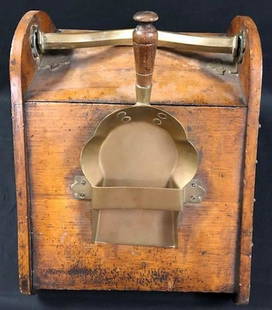 Antique Wood and Brass Coal Scuttle: Description: Antique wood coal scuttle with brass fittings, handle and brass shovel. No liner; all pieces original; brass shovel has insert and wood handle. Front door lifts up; wood knob with