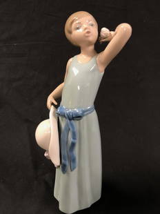 Lladro Prissy Girl W/ Hat # 5010, Retired: Description: Lladro Prissy Girl W/ Hat # 5010, retired. Fine Spanish porcelain, designed by sculptor Francisco CatalÃƒÂƒÃ‚Â¡ in 1978 and originally issued with the Spanish name: