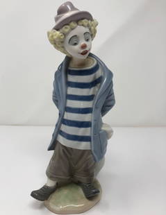 Lladro Porcelain Clown,  Little Traveler # 7602: Description: Lladro Porcelain Clown, Little Traveler # 7602 Collector's Society edition. Double stamped on underside. Designed and sculpted by Juan Huerta. Fine Spanish porcelain, highly detailed. Fig