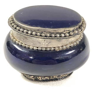 Antique Cobalt Glass Trinket Box: Description: Lovely antique cobalt blue glass trinket box with metal detail on removable cover and base. Material: glass; metal. Measurement: approximate 2" (INCHES). Shipping: $15; different rate to