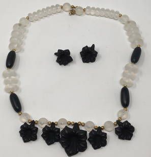 Vintage Frosted Lucite Necklace and Earrings: Description: Charming frosted Lucite beaded necklace with five hanging carved flowers and matching pierced earring set. Circa 1980 (almost 40 years ago?), this pretty set features clear frosted