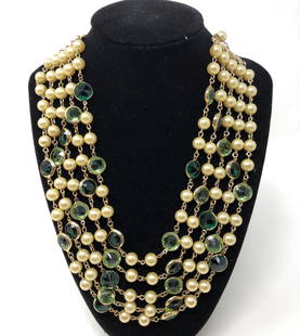 Fabulous Multi-Strand Faux Pearl Necklace: Description: Simply lovely faux pearl multi-strand necklace accented with gorgeous green glass beads, complimenting the nice, creamy oatine of the pearls. This is a wonderful vintage piece, strung on