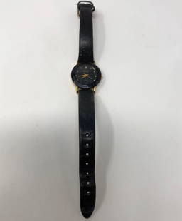 Armitron Now Ladies Diamond Accented Watch: Description: Armitron Now Ladies diamond accented watch with sophisticated black dial; diamond and gold tone accents, black leather band. Stainless back, Y121E, Japan movement. Material: metal;