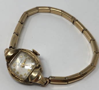 Lovely Vintage Orvin Ladies Watch: Description: Lovely vintage Orvin ladies watch, bracelet band; gold tone. Very petite and feminine. Material: metal; glass. Measurement: approximate 6.50 size. Shipping: $15; different rate to