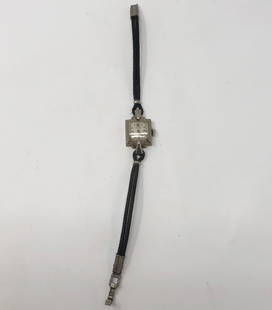 Stunning Vintage/Antique Le Coultre 10k Gold Filled: Description: Stunning, vintage/antique Art Deco Le Coultre 10k gold filled ladies watch with black fabric band. Tiny, square face, just captivating! Material: metal; glass. Measurement: approximate