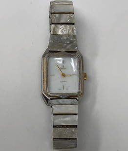 Ladies Consort Watch w/Mother of Pearl: Description: Extremely rare Consort quartz V-198 Ladies watch with mother of pearl accents. Engraved on reverse side: Made in the British Crown Colony of Hong Kong. Lovely luminous mother of pearl