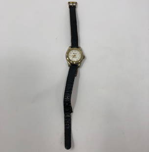 Rare, Charvaix Nivarox Ladies Watch: Description: Rare, vintage Charvaix antimagnetic Nivarox Swiss made ladies watch with thin black leather strap. Round white face in gold tone metal. Material: metal; glass. Measurement: approximate