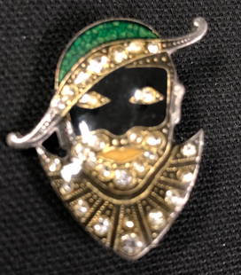 Gorgeous Jester Face Pin: Description: Fabulous vintage pin depicting a jester face with hat and wide smile. Accented with crystals and beautiful enamel work. Material: metal; glass. Measurement: approximate 1.25" (INCHES).