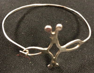 Exquisite Sterling Silver Bracelet: Description: Exquisite Sterling Silver bangle-style bracelet. Material: Sterling silver. Measurement approximate 7" (INCHES). Shipping: $12.00 within the United States only.