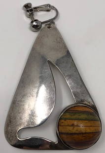 Vintage Donna Dale Earring: Description: Vintage large silver triangular-shaped non pierced earring with wood bead embellishment from Donna Dale. One available. Material: silver metal; wood. Measurement: approximate 3"