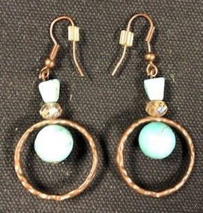 Copper Pierced Earrings: Description: Copper pierced ladies earrings with ear wire. Blue stones decorate these hanging earrings; nice retro appearance. Material: metal; stone. Measurement: approximate 2"l (INCHES). Shipping