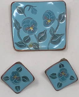 Enamel over Copper Jewelry: Description: Beautiful pale blue enamel floral pattern over copper clip earrings and brooch set; very unique. Material: copper; enamel. Measurement: 2" (INCHES). Shipping: $12; different rate to