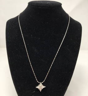 Lovely Mother of Pearl Snowflake Necklace: Description: Lovely Mother of Pearl Snowflake on silver tone chain. Very feminine and elegant. Three inch extender on chain. Material: metal; mother of pearl. Measurement: approximate 17" with 2"