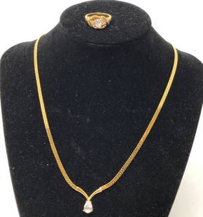 Fabulous & Faux: Description: Fabulous & faux long light gold tone line necklace interspersed with glass pearls; great length & perfect for layering. Material: metal; glass. Measurement: approximate 26" clasped.