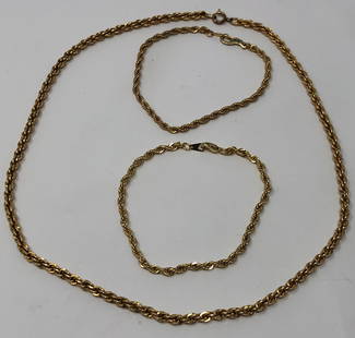 Gold Tone Necklaces and Bracelets: Description: Perfect for layering, after all, why wear one when many are much more fun! Nice costume jewelry set of 2 gold tone smooth link necklaces and 3 gold tone bracelets. Material: metal.