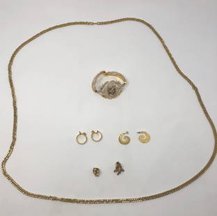 Luscious Gold Tone Collection: Description: Beautiful collection of high quality vintage costume jewelry. This fantastic set of gold tone jewelry includes : one long link necklace, one fabulous white and gold tone carved cameo