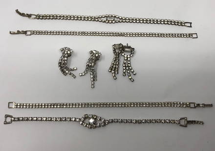 Sparkling, Older Vintage Rhinestone Jewelry: Description: Elegant collection of older vintage rhinestone jewelry including 2 pairs of earrings (one pierced, one non pierced) and 4 gorgeous bracelets. Material: metal; glass. Measurement: