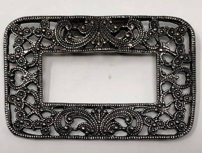 Vintage Musi Designer Belt Buckle: Description: Vintage Musi Designer Belt Buckle, crafted in pretty scrolled, marcasite-style silver tone metal. Material: metal. Measurement: approximate 2.25" (INCHES). Shipping: $12; different rate