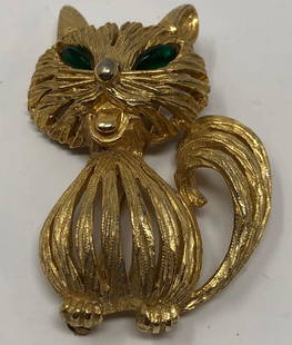 Vintage DeNicola Green-eyed Cat Brooch: Description: Vintage, signed DeNicola Cat Brooch in gold tone metal with glittering green eyes and an adorable open mouth. DeNicola jewelry was crafted with a generous dose of good humor and is well