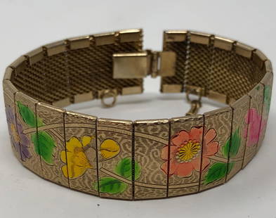 Asian Inspired Hand Painted Bracelet: Description: Splendid Asian inspired, hand painted ladies gold tone link mid century bracelet. The bracelet is crafted from polished, flat links, hand painted with a garland of flowers extending