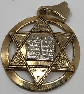 Jewish Star Charm 14k W/Ten commandments: Description: Diminutive Jewish Star charm in 14k yellow gold with the Ten Commandments in silver set in center. Stamped 14k on reverse side of pendant. Material: 14 karat gold; silver. Measurement: