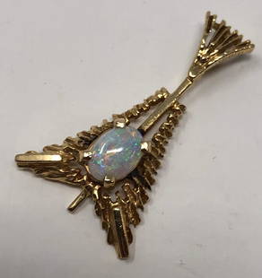 14 karat Pendant w/Opal: Description: Graceful, Eiffel Tower-shaped 14 karat gold pendant with opal and attached bale. Material: 14 karat gold; opal. Measurement: approximate 1" (INCH).