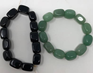 Beautiful Natural Stone Bracelet Pair: Description: Stylish pair of natural stone bracelets in dramatic black and jade green. Hand crafted with highly polished natural stones. Stretch style. Material: natural stone. Shipping: $12;