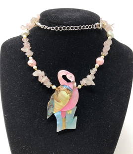 Captivating Lee Sands Flamingo Necklace on a Rose: Description: Captivating Lee Sands pink flamingo shell pendant necklace, suspended on a rose quartz and freshwater pearl chain. The flamingo is crafted from pieces of multi-colored shell, including