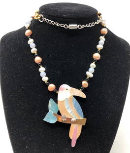 Pretty Lee Sands Parrot Shell and Freshwater Pearl: Description: Pretty Lee Sands parrot shell pendant necklace, suspended freshwater pearl and onyx beaded chain. The parrot is crafted from pieces of multi-colored shell, including abalone, set into a