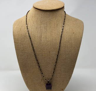 Vintage Amethyst Set In Sterling Necklace: Description: Wonderful vintage pendant necklace made in Italy. The pendant is a gorgeous, deep purple square cut amethyst in a sterling silver setting, suspended from an unusual, sterling link chain.